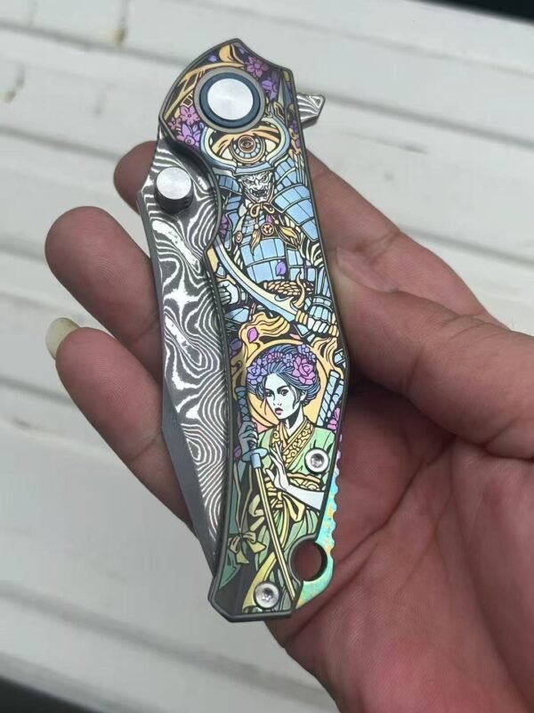 Dark vg10 Damascus steel folding knife with titanium handle, exquisitely engraved - Image 3