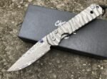 Christoph Damascus Titanium Handled Folding Knife (Wave Pattern)